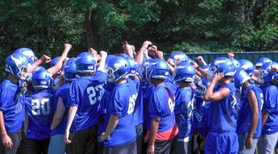 The Vikings players huddle up before practice. Photo by Christian Uva