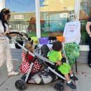 Trick or treaters stroll down Main Street. 
