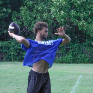 Senior quarterback Amare Rose throws a pass. Photo by Christian Uva
