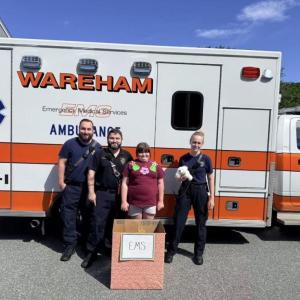 Ainslee Manduca brings stuffed animals she collected to local emergency medical technicians. Submitted photo