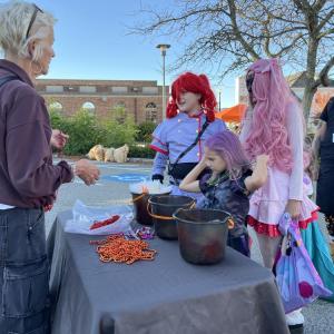 Kids get candy and jewelry. 