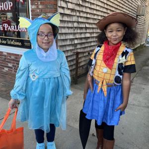Victoria Perry, 7, and Harmony Lina-Howard, 8, show off their costumes. 
